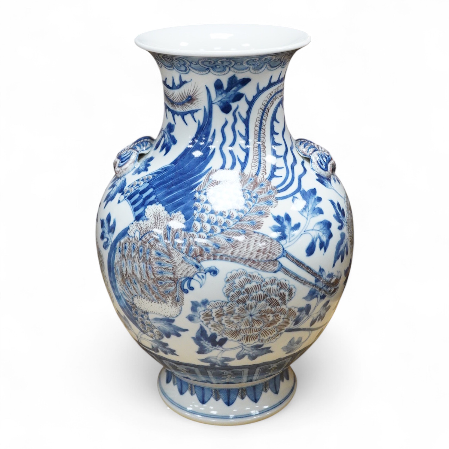 A Chinese underglaze blue and copper red baluster vase, 32cm high